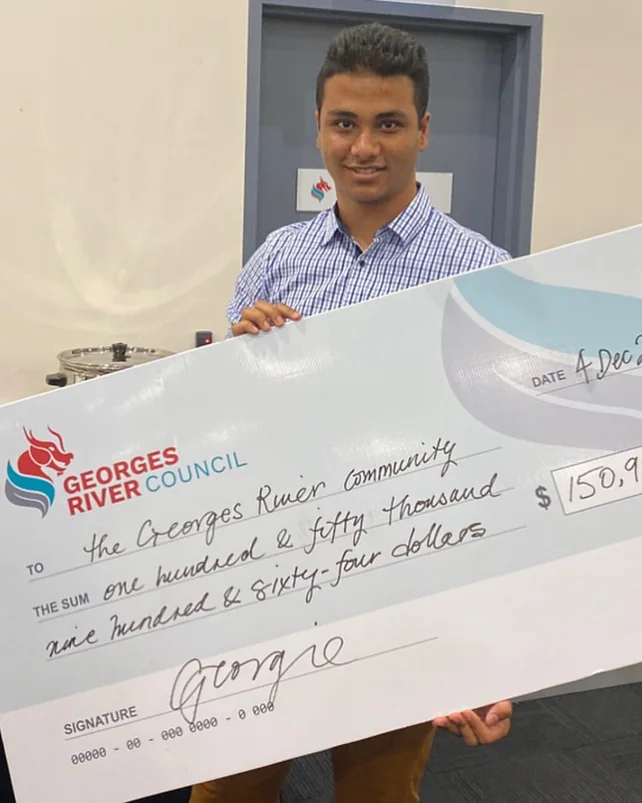 Nehal Nafcy presenting a Georges River Council community grant