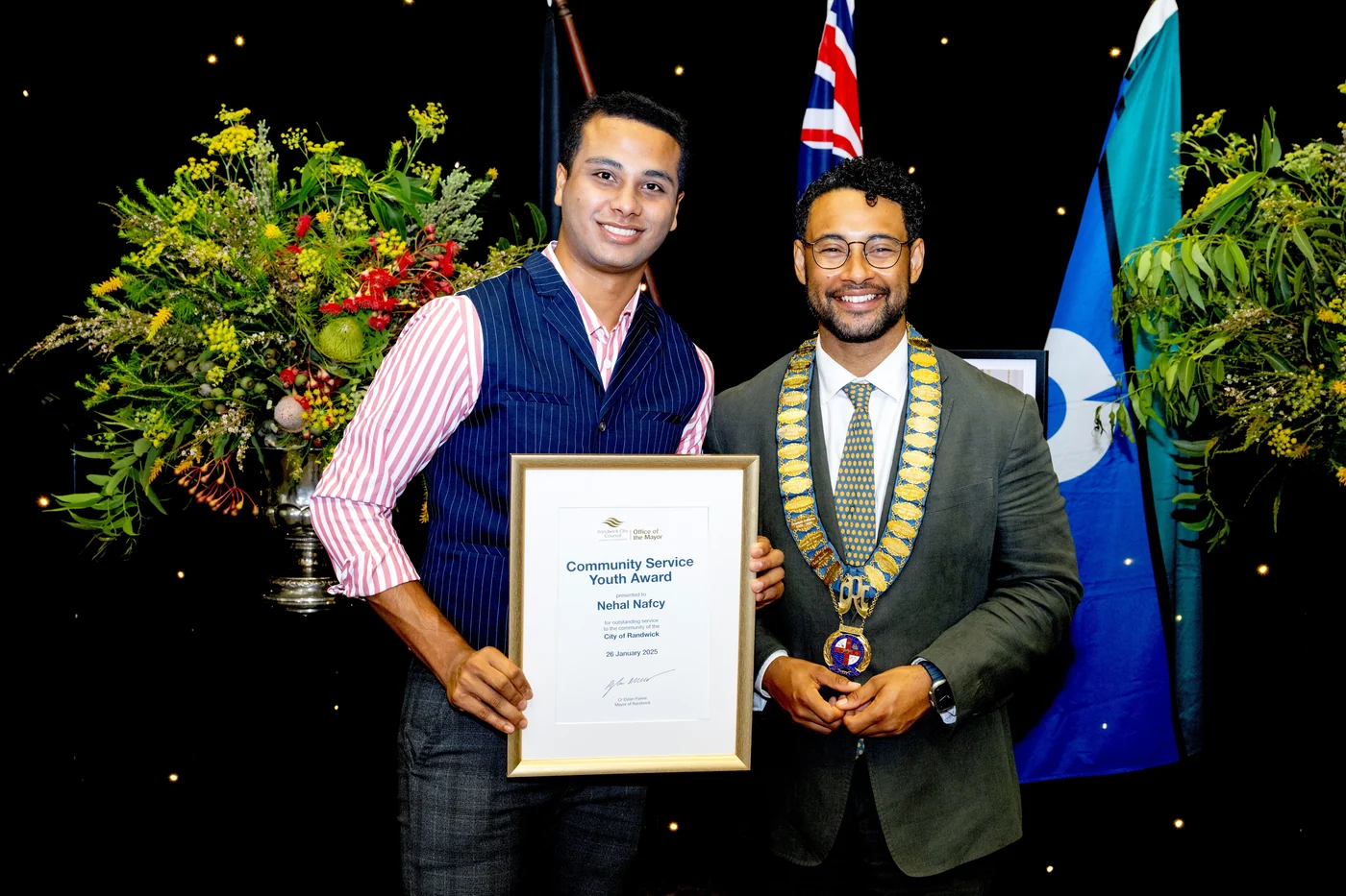 Nehal Nafcy receiving an award